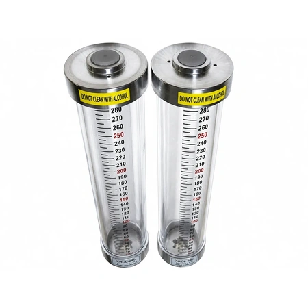 Two tubular oil level gauges.