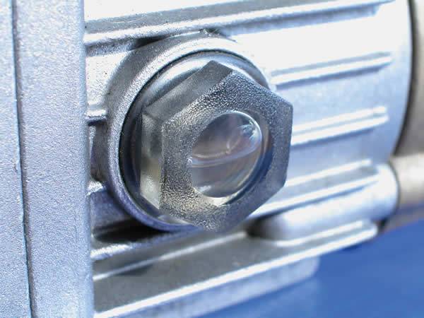 A photo of oil sight glass installed on the equipment.